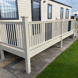 An example of a fully installed 16' x 6' end patio in the cream colour 